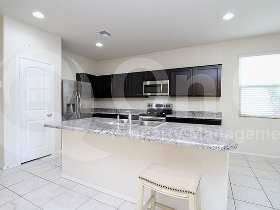 3rd image of 36878 W Maddaloni Ave