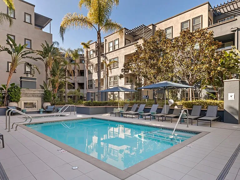 Swimming pool and spa with lounge seating