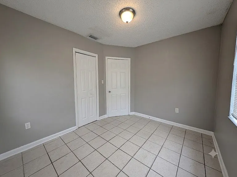 7704 N Taliaferro Ave — Photo 12