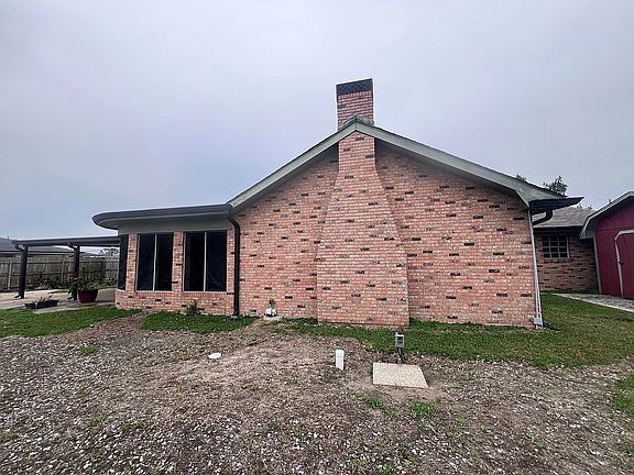 Backyard view of fireplace