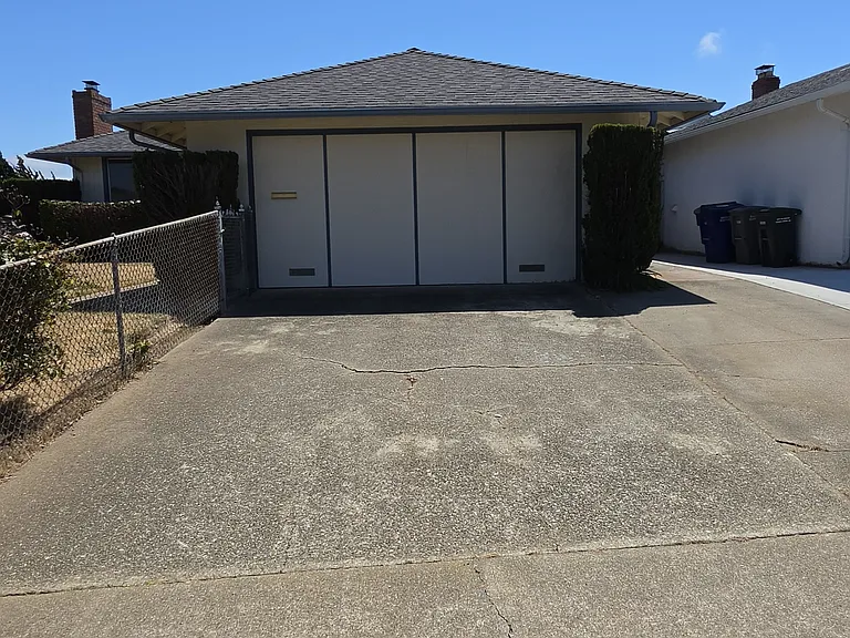 Two car side by side garage and two car driveway