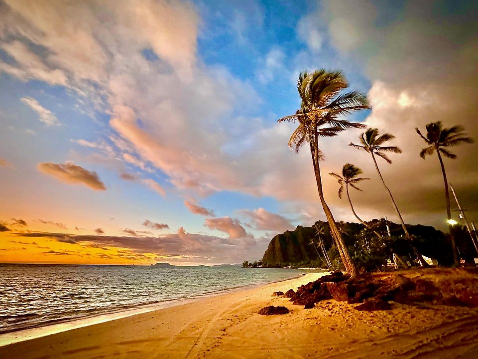 Watercolor skies with golden sand
