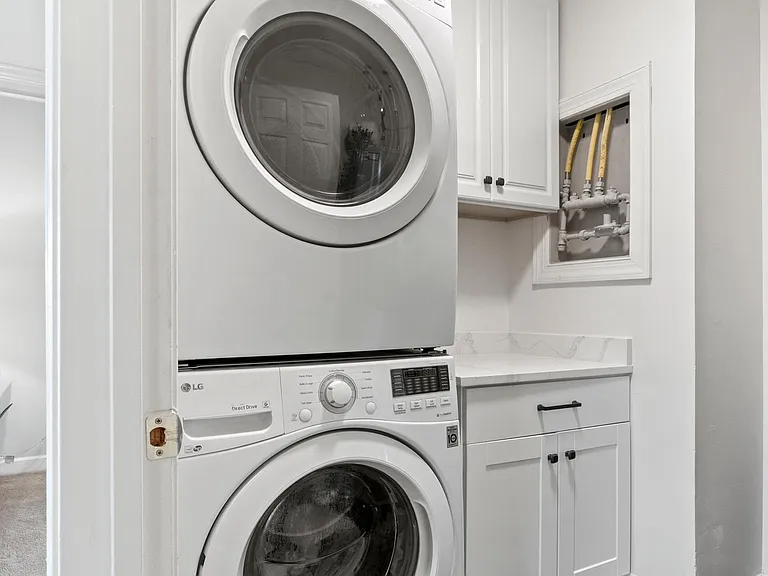 laundry room with full sized washer and dryer