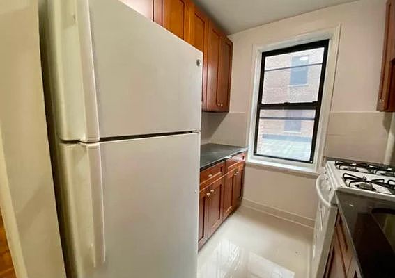 2nd image of 66-20 Wetherole St #1DD