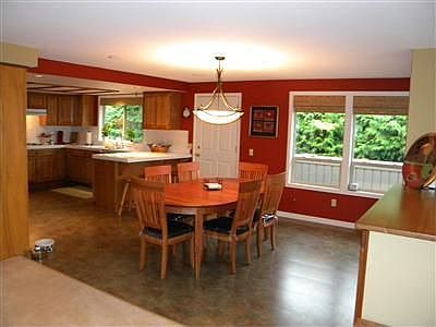 Inviting Kitchen with great work space, double ovens, Cooktop and eating bar.