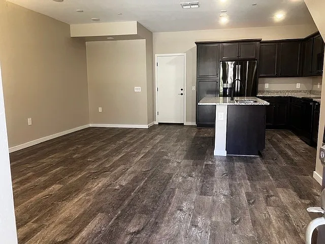 Open concept with main living and kitchen.