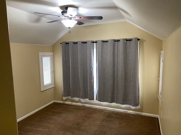Bedroom 2. View of front of house.