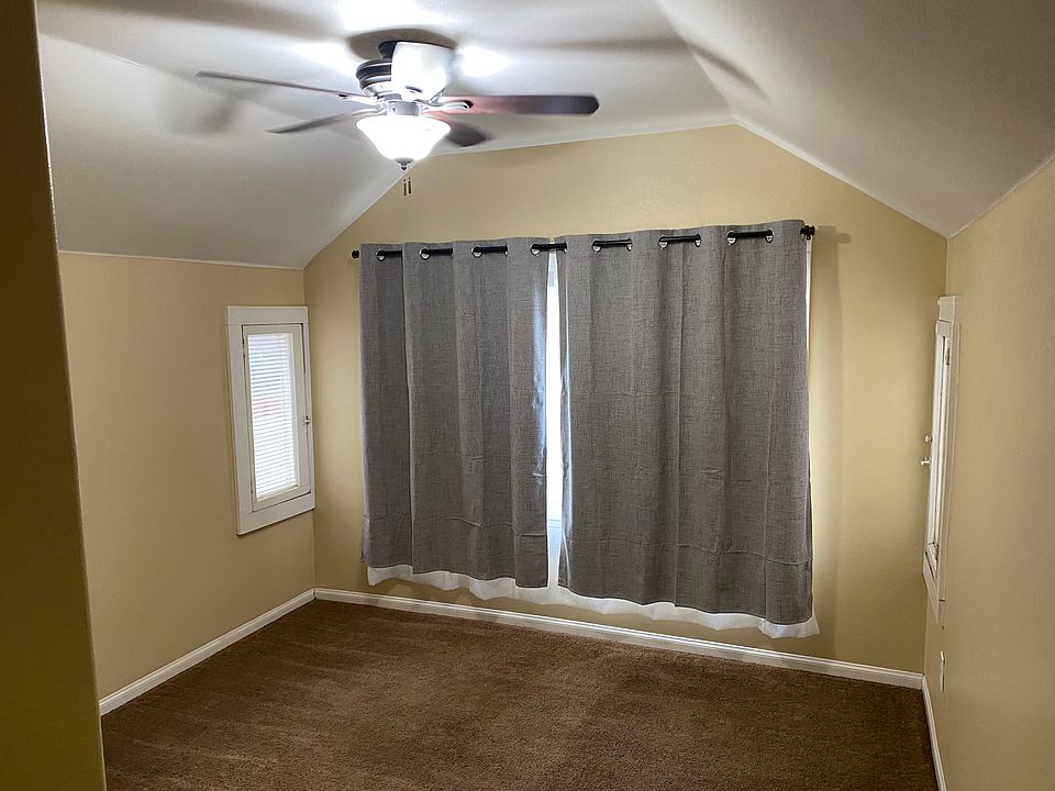 Bedroom 2. View of front of house.