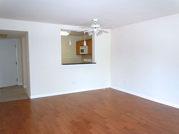 Another View of Living Room with Crisp Walls Ready for Your Design