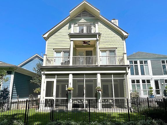 Back of house facing pond