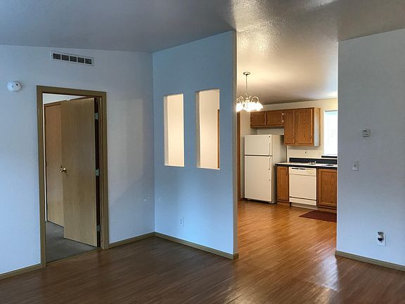 Entrance looks into kitchen. Door on left is to the Master b