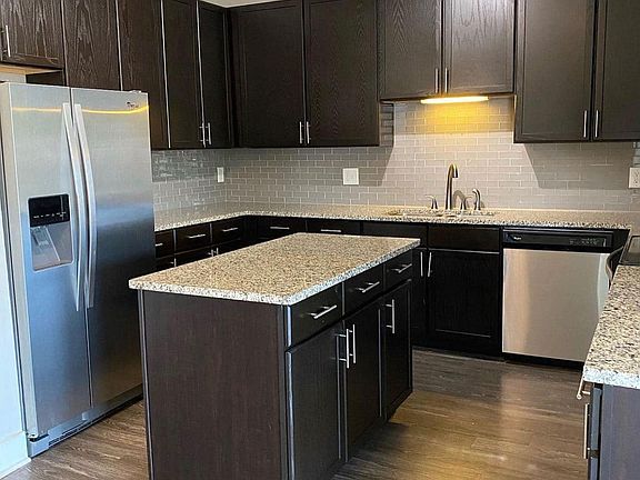 Kitchen with Modern Backsplash & Island