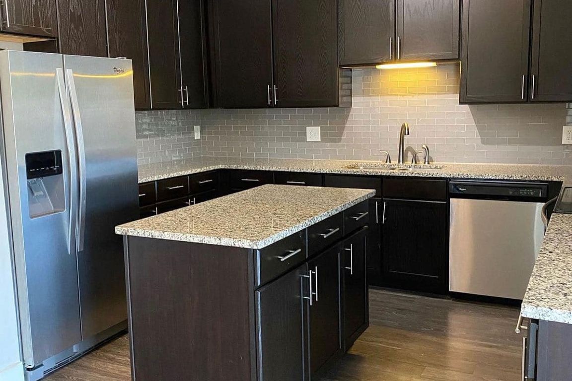 Kitchen with Modern Backsplash & Island