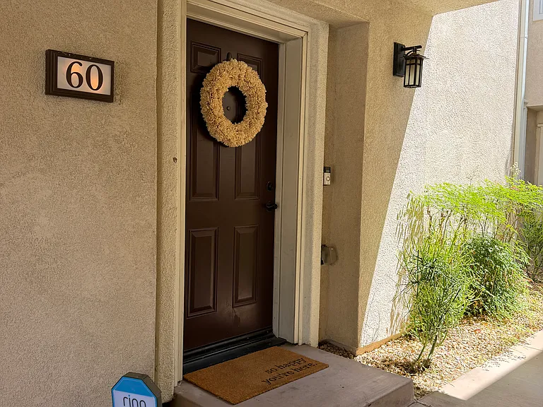 Private entry with covered porch.