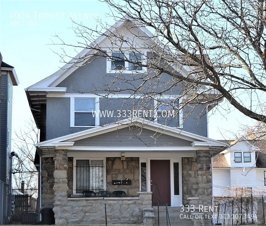 Large converted duplex close to UMKC & Rockhurst with old-world charm and stunning extras through... — Photo 1