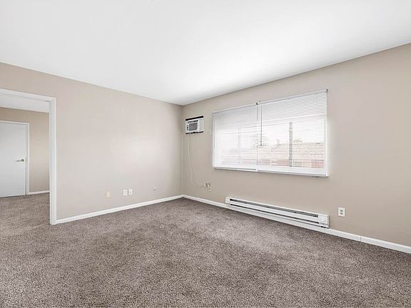 The apartments offer new plush carpeting and freshly painted walls in every room
