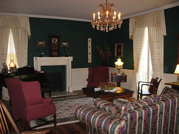 Living Room
						:
						One of the original rooms. Drapes and baby grand stay!