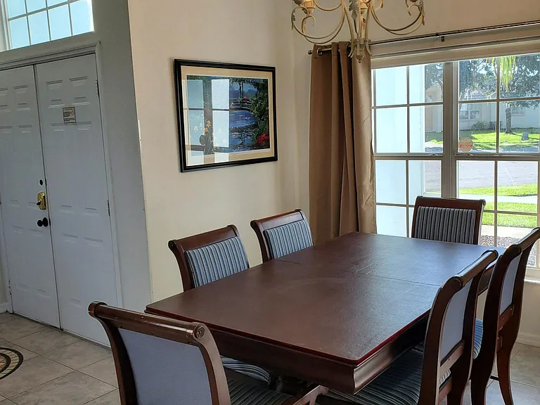 Dining room. The table has 2 extra"leaves" to expand and extra chairs