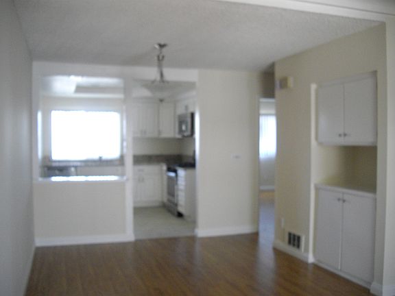 view into kitchen and hall