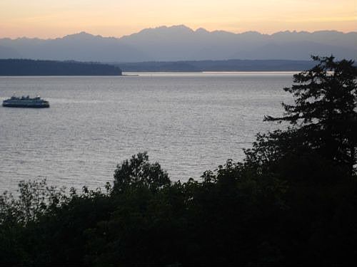 The Olympic range, Puget Sound, and ferry from the living room.
