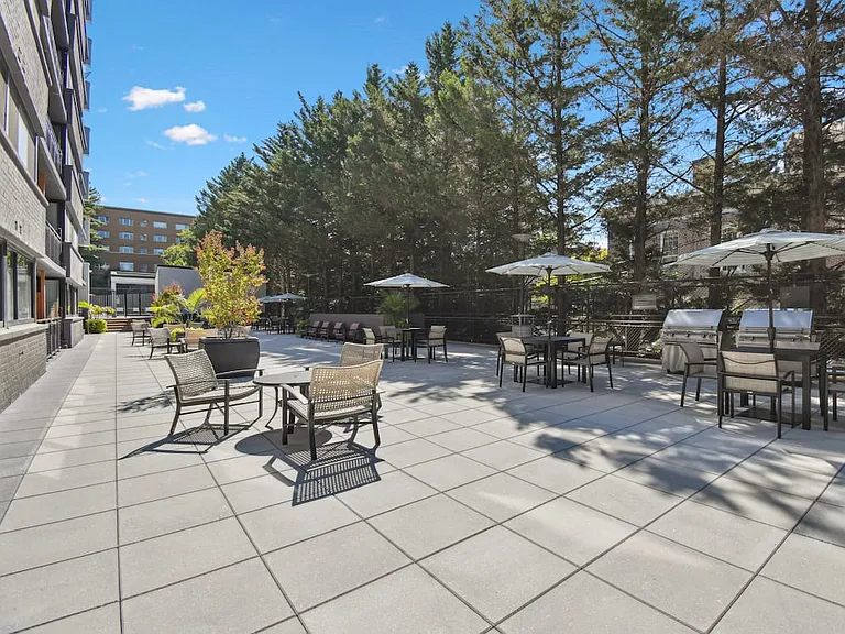 Courtyard with BBQ grills and picnic areas