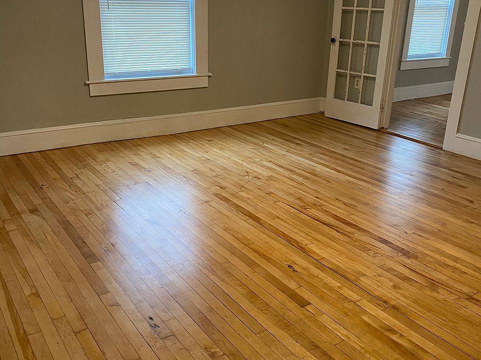 Living Room: refinished hardwood floors, new windows to reduce energy costs, new walls/ceiling and wainscotting paintedLiving Room: refinished hardwood floors, new windows to reduce energy costs, new walls/ceiling and wainscotting painted, new blinds hung