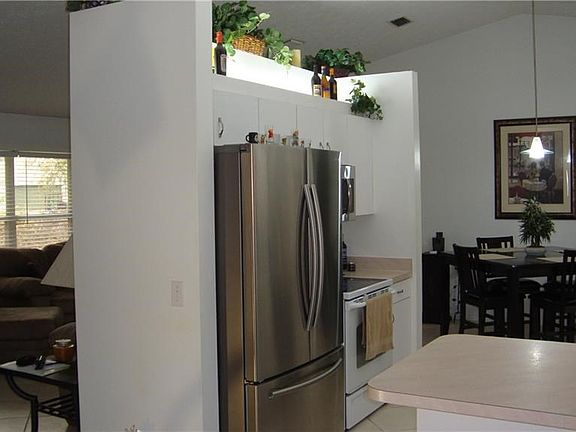 Kitchen; living room to the left and dining area straight thru.