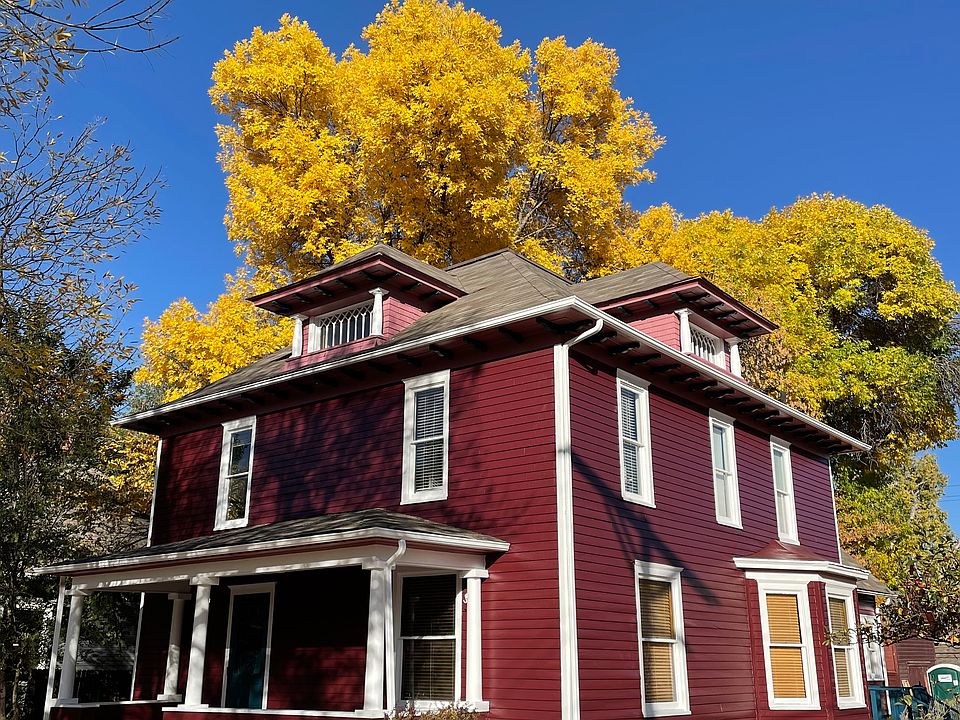 The apartment is the second floor of this house in old town Longmont.