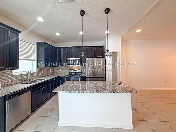 2nd image of 6983 Tussilago Way #1