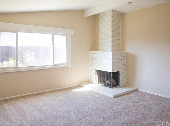 The Living Room with Fireplace.