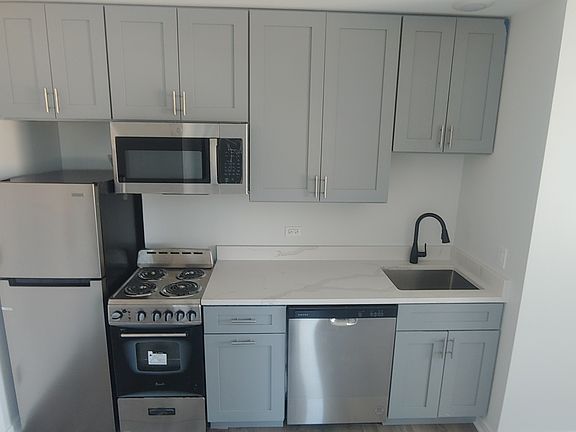 3rd image of 5366 S Laramie Ave #202