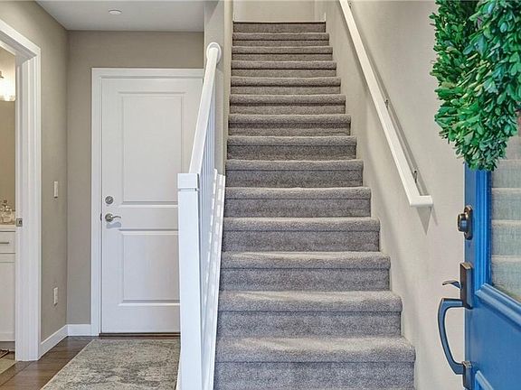 Entrance to the first-floor bedroom/office and a 3/4 bathroom. Also, the access to the garage is from the first floor.