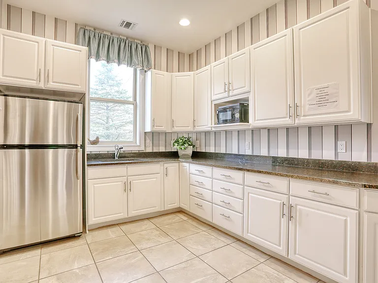 Modern community clubhouse kitchen with comfortable entertaining space