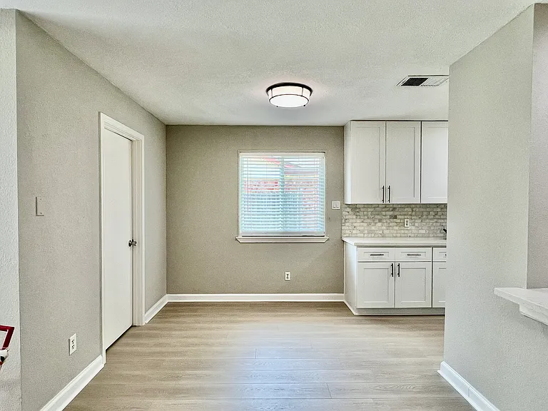 A spacious casual dining area is just off the kitchen.