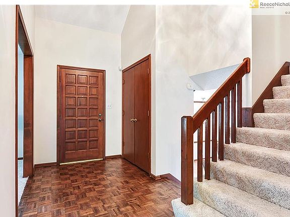 Freshly refinished parquet floor in entry