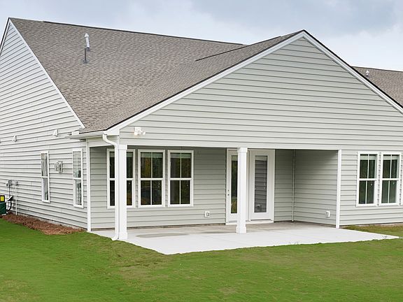 Spacious backyard with patio