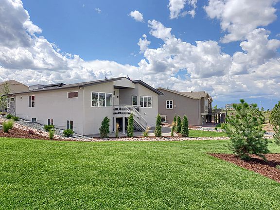 Rear Deck Photo representing home to be built and may demonstrate optional features