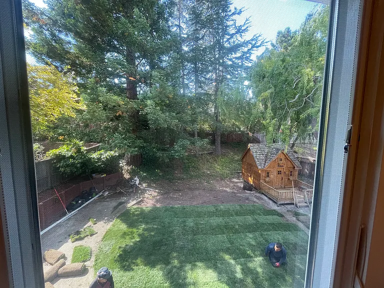 View of the backyard from the primary bedroom