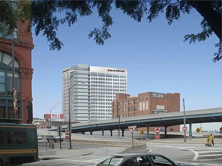 Water Street Condominiums in front of Flats East Bank Development rendering