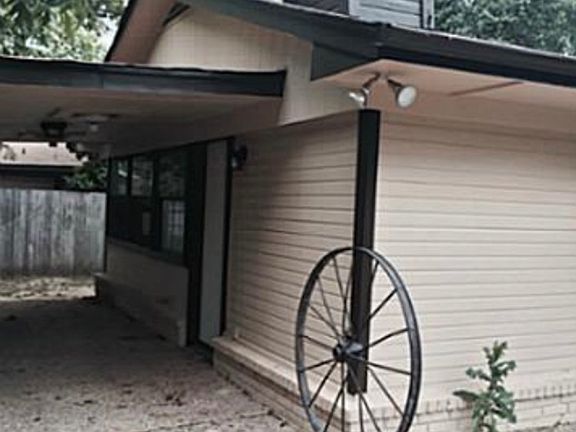 Back patio with firewoodrack