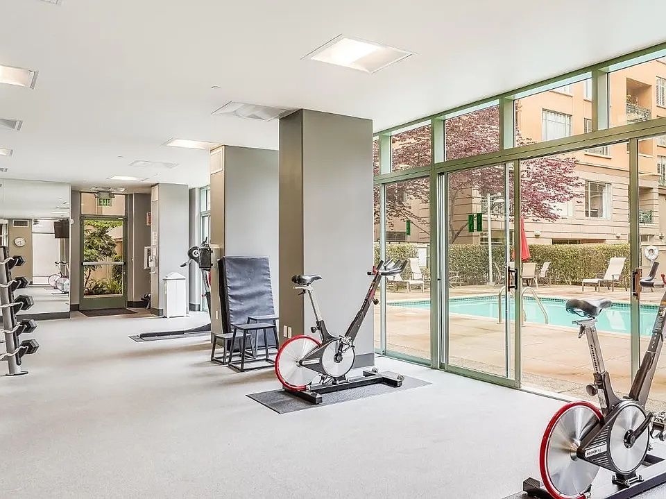 Community amenities include a fully equipped fitness center, relaxing sauna, and heated pool.