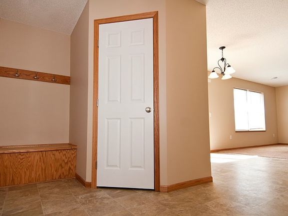 Walk in closet in entryway