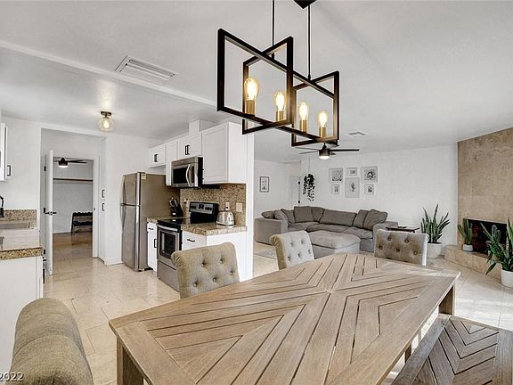 Dining room, kitchen and living view