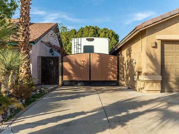 5th image of 8642 W HARMONY Lane