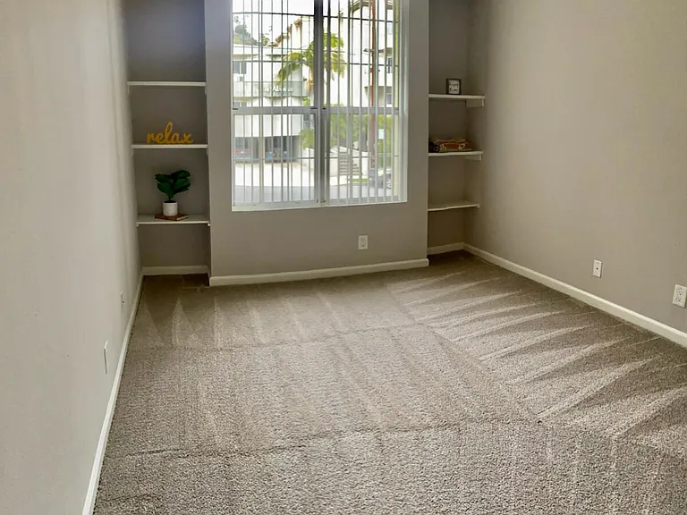 Apartments in Hollywood, CA - The Summit Livingroom with built-in bookcases