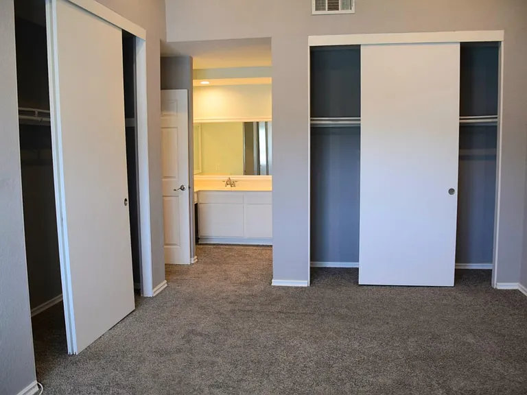 Master bedroom from window side. Master has two very large closets.
En suite bathroom is straight ahead.