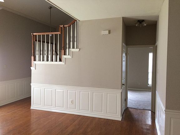 One bedroom down and two bedrooms upstairs