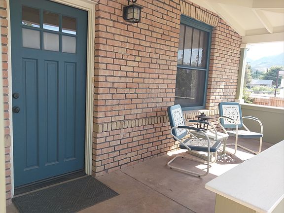 Large front porch overlooking the city park