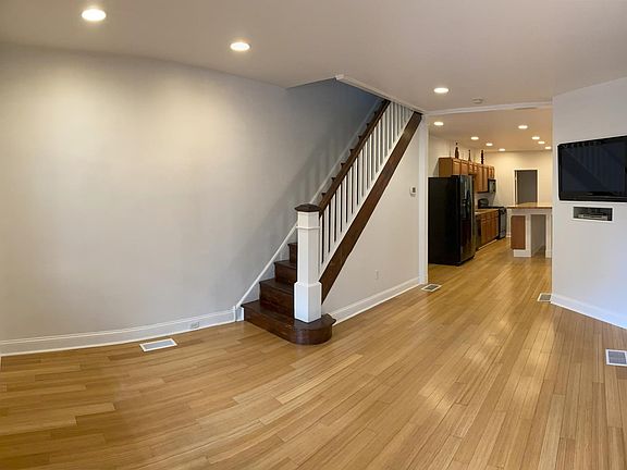 Living Room opening to Dining Rm / Kitchen