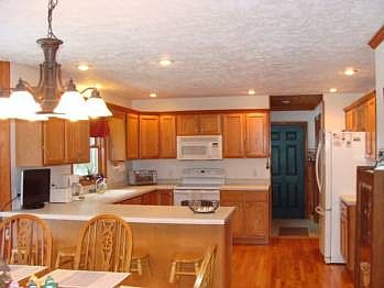 The kitchen appliances all stay.